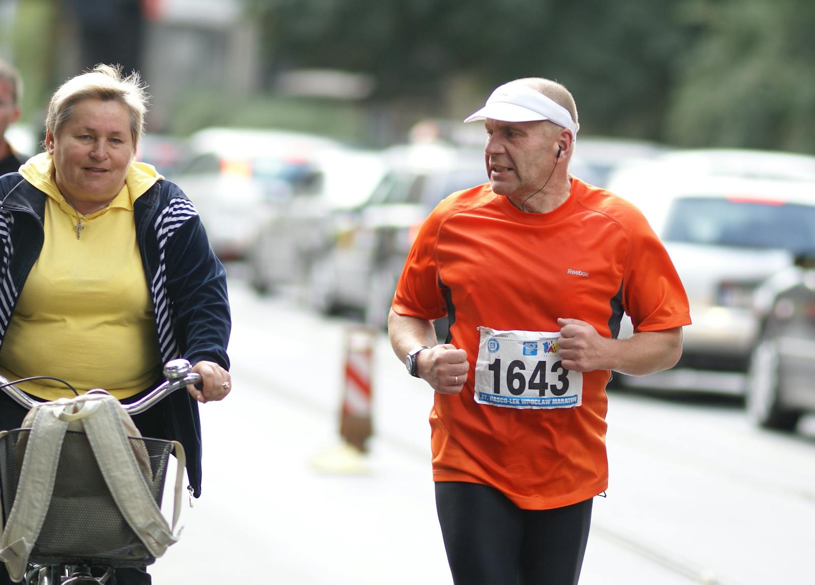 A man and woman running in a race